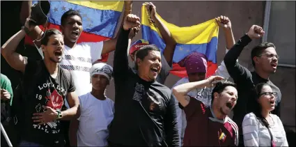  ??  ?? Youth scream during a march against the government of in Caracas, Venezuela, on Tuesday. AP PHOTO/ARIANA CUBILLOS