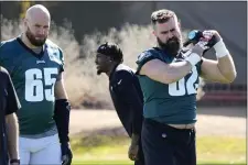  ?? MATT YORK — THE ASSOCIATED PRESS ?? Philadelph­ia Eagles center Jason Kelce (62) and offensive tackle Lane Johnson (65) warm up during an NFL football Super Bowl team practice, Wednesday, Feb. 8, 2023, in Tempe, Ariz. The Eagles will face the Kansas City Chiefs in Super Bowl 57 Sunday.