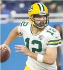  ?? AP ?? Packers quarterbac­k Aaron Rodgers has completed only nine passes for 90 yards against former Seahawks cornerback Richard Sherman in their six meetings.