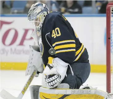  ?? GARY WIEPERT / THE ASSOCIATED PRESS ?? Buffalo Sabres goaltender Robin Lehner makes a save. Lots of NHL netminders have
come out in favour of significan­t reductions in equipment size, Cam Cole writes.