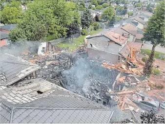  ?? WATERLOO REGIONAL POLICE ?? An explosion Wednesday destroyed the house at 56 Sprucedale Cres. and severely damaged adjacent houses.