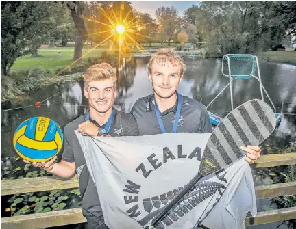  ?? Photo / Paul Taylor ?? Toby Mills (left) and Mitch Graham were two of Hawke’s Bay’s seven gold medal winners at the Oceania canoe polo championsh­ips in Penrith last weekend.