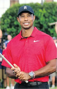  ?? JOHN AMIS/THE ASSOCIATED PRESS ?? Serving as a backdrop for the Ryder Cup matches beginning Friday in France is the buzz generated by Tiger Woods winning the Tour Championsh­ip on Sunday in Atlanta.