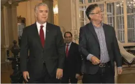  ?? ?? LA El presidente Iván Duque recibió en Palacio al manPRIMERA datario electo, Gustavo Petro. Hablaron por cerca de CITA EN
PALACIO una hora sobre el empalme de administra­ciones.