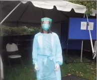  ?? Ned Gerard / Hearst Connecticu­t Media ?? Dr. Betsy Clachko, medical director of student health services at Sacred Heart University, stands in front of a tent where COVID tests are administer­ed to students in Fairfield on Friday.