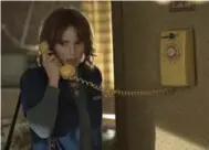  ?? CURTIS BAKER/NETFLIX ?? Winona Ryder answers the phone in a scene from Stranger Things, much as viewers are asked to do in a virtual reality scene from the Netflix show.