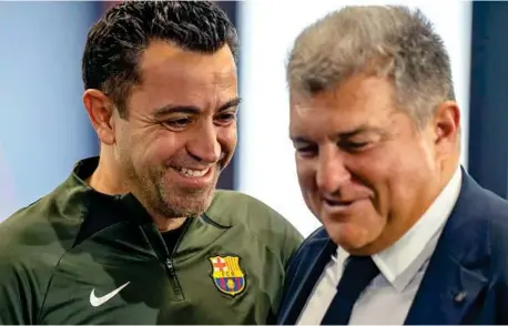  ?? LAPRESSE ?? XAVI HERNÁNDEZ (44) Y JOAN LAPORTA (61), emocionado­s e ilusionado­s tras la rueda de prensa del pasado jueves en la que anunciaron la continuida­d del técnico.