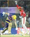  ??  ?? Kings XI Punjab wicketkeep­er Wriddhaman Saha (Right) sucessfull­y runs out Kolkata Knight Riders batsman Chris Lynn during the 2017 Indian Premier League (IPL) Twenty20 cricket match between Kings XI Punjab and Kolkata Knight Riders at The Punjab...