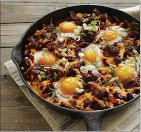  ?? (“Fresh Eggs Daily Cookbook”/Tina Rupp) ?? Bacon and Beet Hash