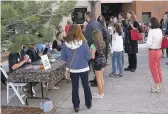  ?? NEW MEXICAN FILE PHOTO ?? Prospectiv­e students and parents visit the Desert Academy campus in 2017 during an open house.