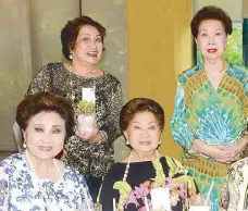  ??  ?? Letty Hahn and Tessie Rodrigo with (standing) Evelyn Ranada, Lydia Reyes