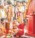  ??  ?? Rahul Gandhi with Cong leaders Jyotiradit­ya Scindia &amp; Kamal Nath offer prayers at Pitambara Shakti Peeth, in Datia.