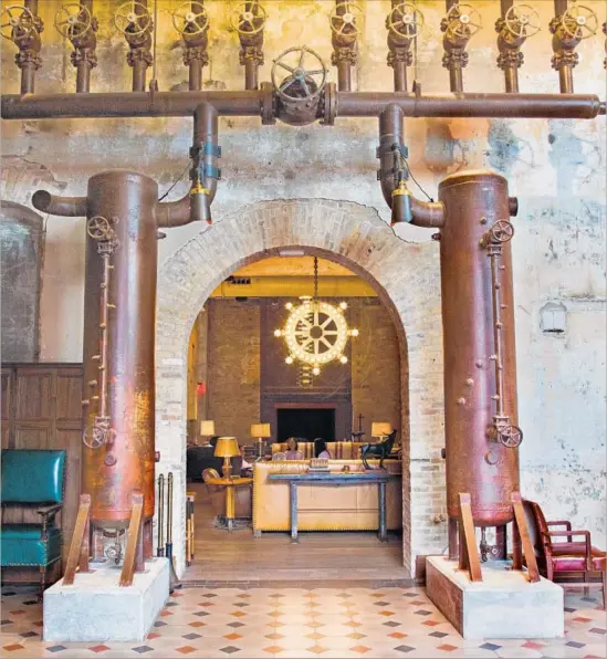  ?? Ray Whitehouse For The Times ?? PIPES in Pearl Brewing Co.’s old brew house lend a steampunk vibe to current residents Hotel Emma and its Sternewirt­h bar in San Antonio, Texas’, Pearl District.