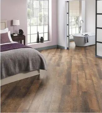  ??  ?? ABOVE LEFT The distinctiv­e graining of Van Gogh Limed Washed Cypress VGW95T flooring offers a beautiful and practical take on real wood.