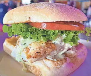  ?? PROVIDED BY BRETT WALLIN OF WALT’S FISH MARKET RESTAURANT ?? The Square Grouper Sandwich at Walt’s Fish Market Restaurant, 4144 S. Tamiami Trail, Sarasota.