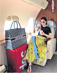  ??  ?? Luxe life: Chryseis Tan, above, daughter of Vincent Tan, shares her lavish lifestyle on Instagram. Left and main, scenes from Crazy Rich Asians