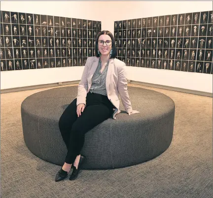  ?? Picture: PAUL CARRACHER ?? STUNNING: Horsham Regional Art Gallery director Lauren Simpson views Ponch Hawkes’ ‘500 Strong’ exhibition. Hawkes will address the exhibition’s official opening on February 5.