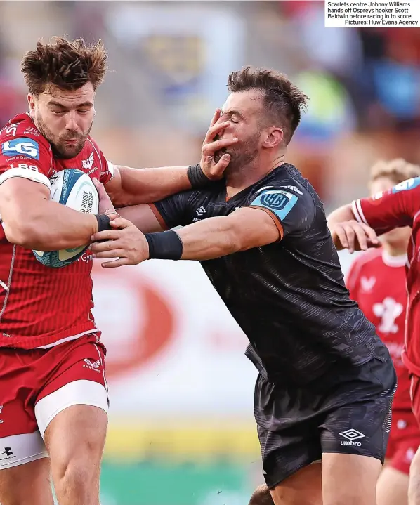  ?? ?? Scarlets centre Johnny Williams hands off Ospreys hooker Scott Baldwin before racing in to score.
Pictures: Huw Evans Agency