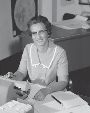  ?? NASA via The Associated Press ?? NASA mathematic­ian Katherine Johnson, shown in 1966, calculated trajectori­es by hand for the Mercury program and Apollo 11’s historic moon landing. Her story and that of other African-American “computers” who worked for the space agency was told in the book and film “Hidden Figures.”