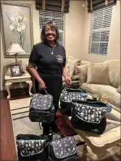  ?? COURTESY PHOTOS ?? Registered nurse and maternal health teacher Gwendolyn Black-amie is seen Feb. 29. She is pictured with bags for mothers in a shelter. She taught them about prenatal health and about a baby’s health needs in their first few months.