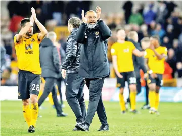  ?? — Reuters photo ?? Wolverhamp­ton Wanderers manager Nuno Espirito Santo applauds fans after the match against Manchester United at the Molineux Stadium in Wolverhamp­ton April 2, 2019.