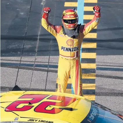  ?? CHRIS GRAYTHEN/GETTY PHOTOS ?? Joey Logano celebrates after winning the NASCAR Cup Series FanShield 500 at Phoenix Raceway on March 8, 2020.