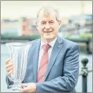 ?? Arthur) ?? JP McManus with the Limerick Persons of the Year Award 2022, which was awarded to the JP McManus ProAm Organising Committee. (Pic: Brian