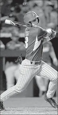  ?? NWA Democrat-Gazette/BEN GOFF ?? Arkansas designated hitter Eric Cole had four hits in five at-bats Friday night, the last one resulting in the winning run for the Razorbacks when Georgia committed two errors on an attempted sacrifice, allowing Evan Lee to score from first.