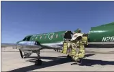  ?? CBS DENVER ?? A Key Lime Air Metroliner that landed safely at Centennial Airport after a mid-air collision near Denver on Wednesday.
