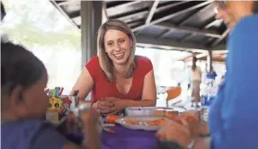  ?? MARIO TAMA/GETTY IMAGES ?? Democratic congressio­nal candidate Katie Hill of California climbs mountains, which she says isn’t as hard as battling corporate politics.