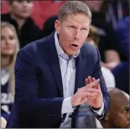  ?? (AP file photo) ?? Gonzaga, led by Coach Mark Few, edged Baylor for the top spot in The Associated Press men’s top 25 preseason poll released Monday. It is the first time Gonzaga, which finished 31-2 last season, has been ranked No. 1 in the preseason poll.