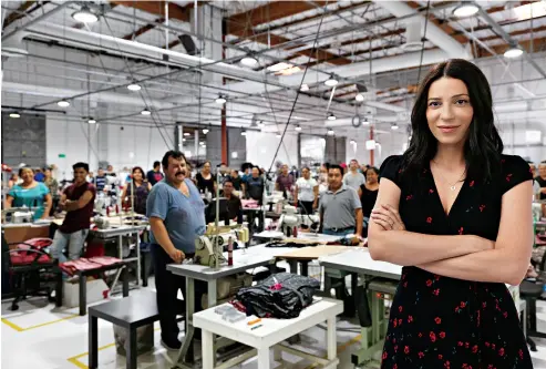  ??  ?? Reformatio­n makes most of its clothes at a Los Angeles factory where CEO Yael Aflalo can keep tabs on quality and promises of sustainabi­lity.