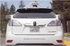  ?? — Reuters ?? The rear of a Lexus SUV equipped with Google self-driving sensors is seen during a media preview of Google’s prototype autonomous vehicles in California.