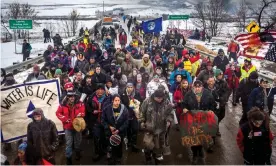  ??  ?? Dakota Access Pipeline water protectors in Standing Rock, North Dakota, in 2017. The Standing Rock Sioux chief welcomed the court’s action on Wednesday. Photograph: Michael Nigro/REX/Shuttersto­ck