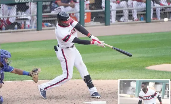  ?? AP (ABOVE), GETTY IMAGES ?? Luis Robert smacks a walk-off home run Sunday, then drops his helmet as he nears the plate.