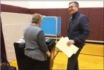  ?? EVAN BRANDT — MEDIANEWS GROUP ?? Upper Pottsgrove resident Steve Carvalho, voting at Pottsgrove Middle School Tuesday said although the ink from the sharpie pen bled through his paper ballot, he thinks Montgomery Councy’s new paper voting ballots are “OK.”