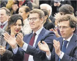  ?? Fernando Sánchez / Europa Press ?? El líder del PP con Isabel Díaz Ayuso y José Luis Martínez Almeida