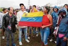  ?? ?? De los 1,8 millones de venezolano­s que hay en Colombia, el 96 % se ha acogido al Estatuto Temporal de Protección para regulariza­r su situación.efe