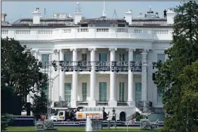  ?? (AP/Patrick Semansky) ?? Lights and staging stand Friday on the South Lawn of the White House, where President Donald Trump is expected to speak during the Republican National Convention next week.