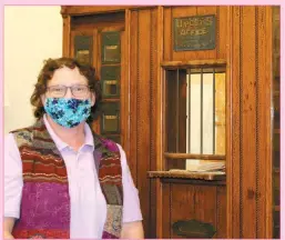  ?? Mona Weatherly ?? Pictured above is Tammy Hendrickso­n, Director of the Custer County Museum, with an antique post office counter she is cleaning and restoring for the museum. Hendrickso­n worked on exhibits and did research while the museum was closed March 17-May 1 due to the COVID-19 shutdown during the COVID-19 shutdown. It was a busy time. “Everyone was stuck at home near a computer, looking things up, sending in questions,” she said. It was six weeks after the museum reopened, June 15, that the museum had its first out-of-state visitor.