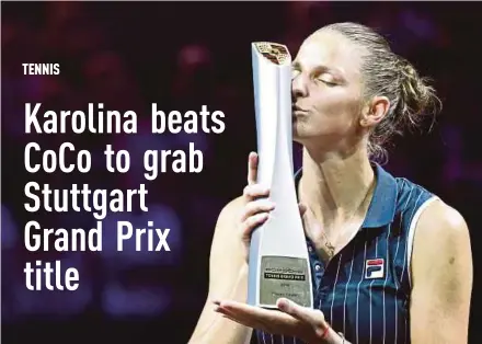  ?? AFP PIC ?? Karolina Pliskova kisses the Stuttgart Grand Prix trophy yesterday.