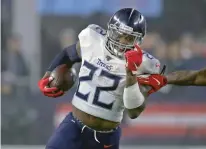  ?? ASSOCIATED PRESS FILE PHOTO ?? Titans running back Derrick Henry runs against the Patriots during a wild-card playoff game Jan. 4 in Foxborough, Mass. ‘I just pray that everybody can be safe. A lot of people have families. People have kids,’ Henry said of the upcoming season.