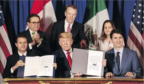  ?? SARAH PABST/BLOOMBERG ?? From front left foreground, Mexican President Enrique Peña Nieto, U.S. President Donald Trump and Prime Minister Justin Trudeau signed the United States-mexico-canada Agreement at the G20 Summit in Buenos Aires on Friday.