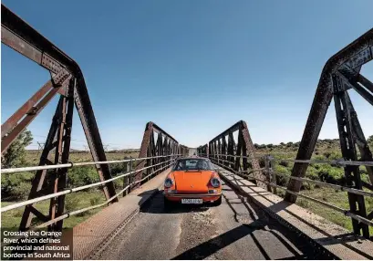  ??  ?? Crossing the Orange River, which defines provincial and national borders in South Africa