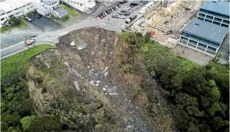  ?? PHOTO: CHRIS MCKEEN/STUFF ?? Part of the Rawene car park in Birkenhead, Auckland, has slipped into a gorge.