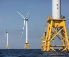  ?? AP FiLe ?? NO WIND POWER HERE: A group of ‘concerned citizens’ is taking aim at wind farms off the coast of Martha’s Vineyard and Nantucket, arguing the plans will disrupt whale habitats. Above, a photo of wind turbines off Block Island, R.I.