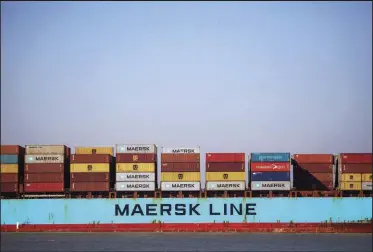  ?? (Bloomberg (WPNS)/Chris Ratliffe) ?? Shipping containers stand on the Maersk Gairloch container ship in March of 2020 as it approaches the Port Felixstowe in the United Kingdom.