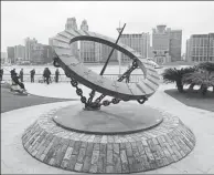  ?? GAO ERQIANG / CHINA DAILY ?? A sculpture that is accused of being a copy of an iconic statue in London is seen along the Huangpu River in Shanghai on Tuesday.