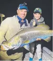  ?? ?? Nate Pritchard with a 103cm barramundi he caught fishing the Tinaroo Barra Bash with his dad, Will.