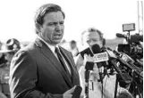  ??  ?? Gov. Ron DeSantis addresses the media Friday at the Pensacola Naval Air Base.